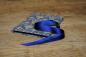 Preview: Leporello standing, black zig-zag pages, yellow ribbon
